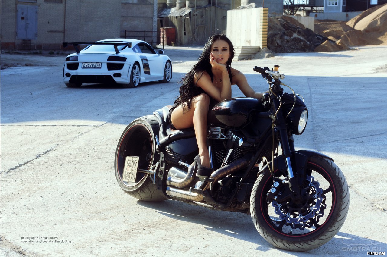 Sexy model Brunettes on a motorcycle in Cano